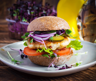 Grilled chicken breast sandwich with thyme sweet potatoes